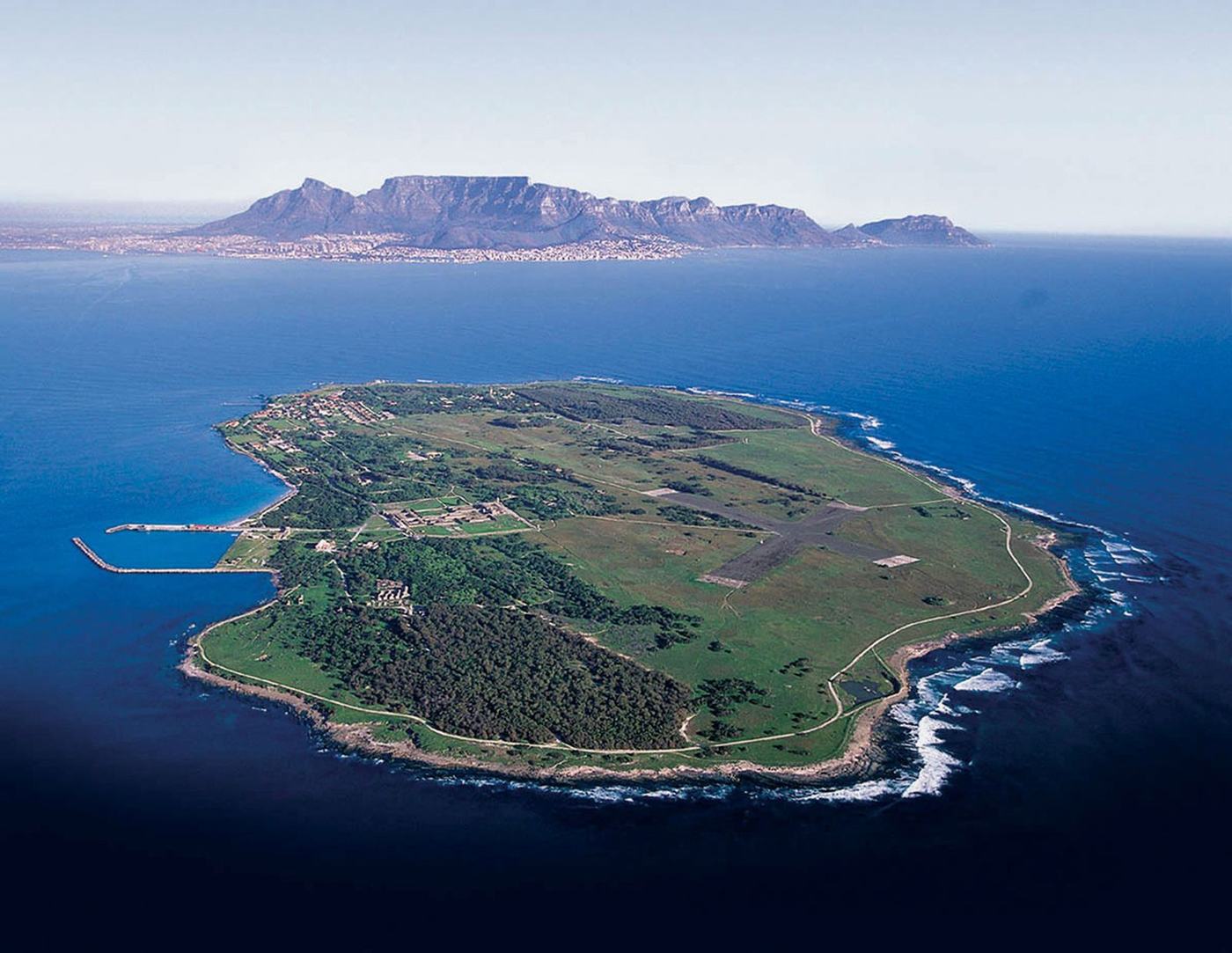 Aerial view of Robben Island with Table Mountain in the background